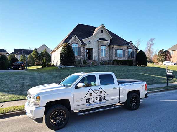 Good People Roofing & Restoration truck and project
